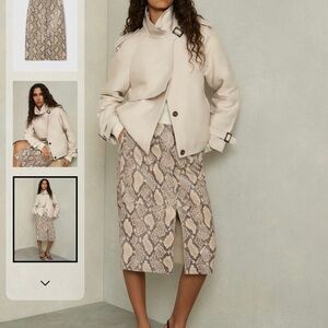 Stylish Leather Snake Print Skirt (new with tags), sizes 14 and 16 are available